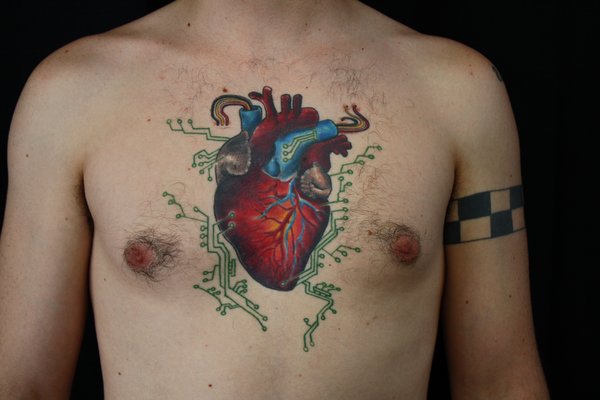 Realistic heart tattoo by Miah Waska