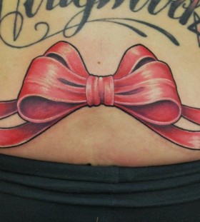 Red bows tattoo