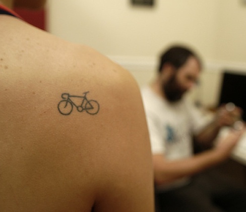 Shoulder bike tattoo