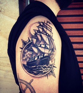 Shoulder ship tattoo