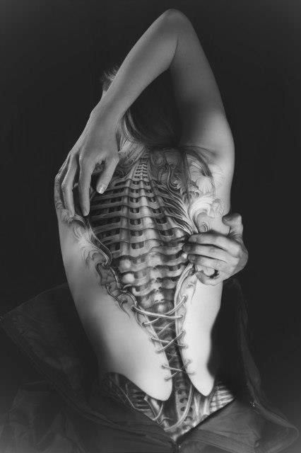 Simple corset tattoo