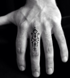 Simple finger tattoo by Jean Philippe Burton