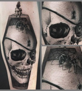 Skull tattoo by Art Junkies