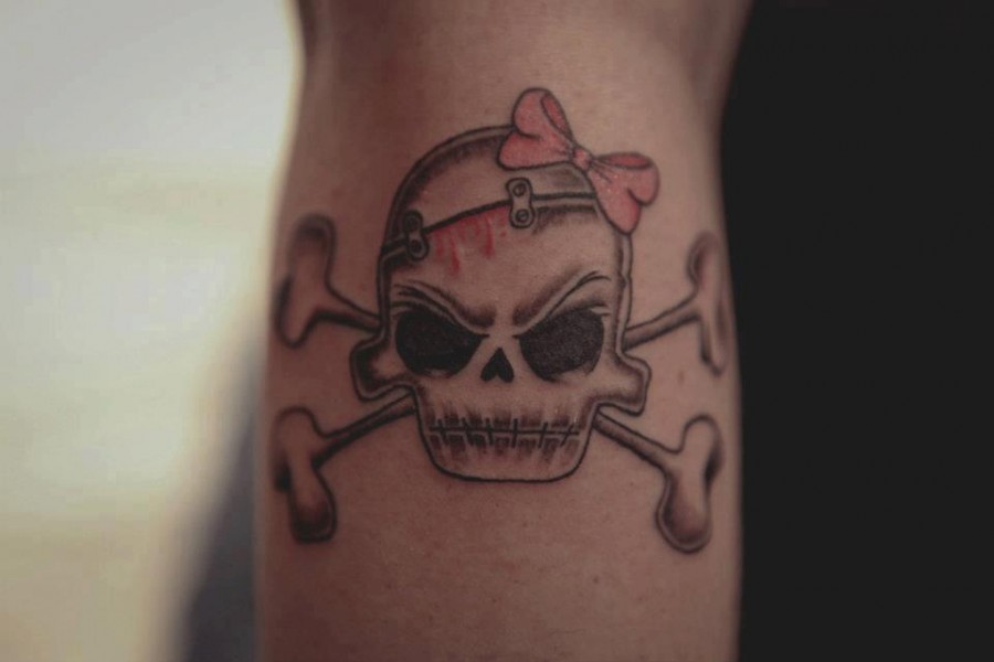 Skull tattoo by Nikki Ouimette