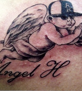 Small baby angel tattoo