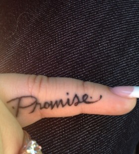 Small finger promise tattoo