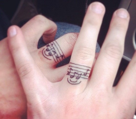 Smile-and-fingers-music-tattoo