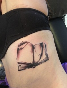 Tattoo with cute book