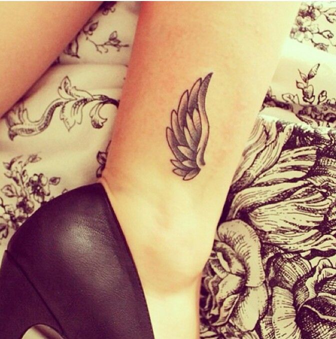 Wings minimalistic style tattoo