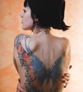 Woman back butterfly tattoo