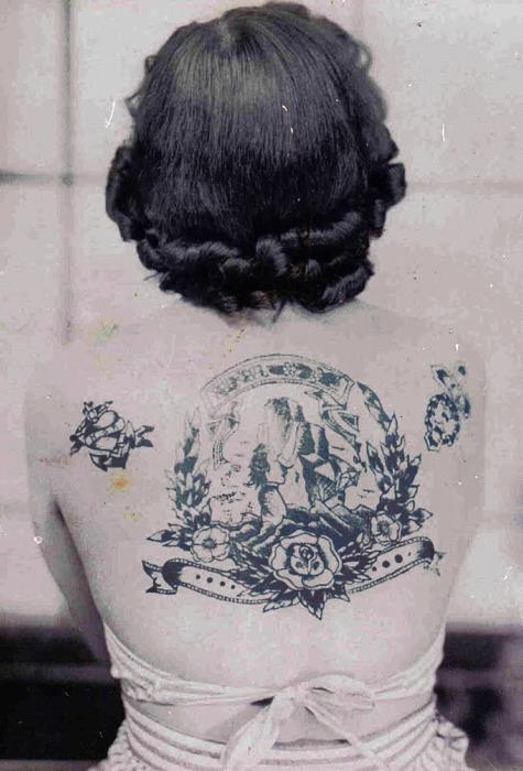 Woman back vintage style tattoos