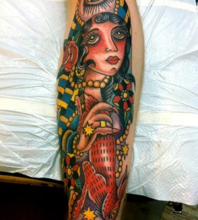 Woman tattoo by Robert Ryan