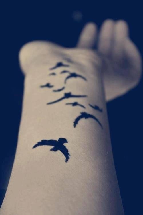 Flying birds tatoos