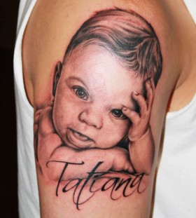 Wonderful tattoo with young baby