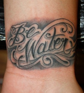Words tattoo by Mike Schweigert