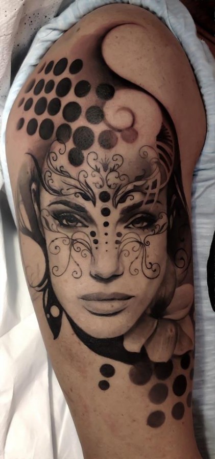 Adorable Angelina Jolie cool tattoo