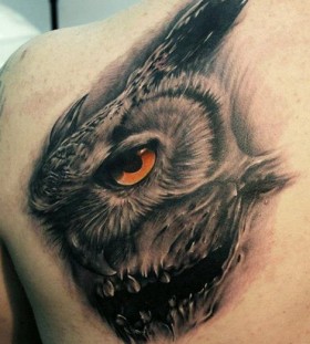 Amazing red owl tattoo