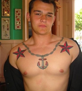 Anchor and red star tattoo