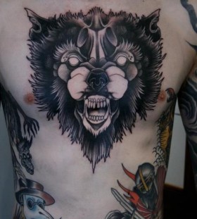 Angry animal tattoo on chest