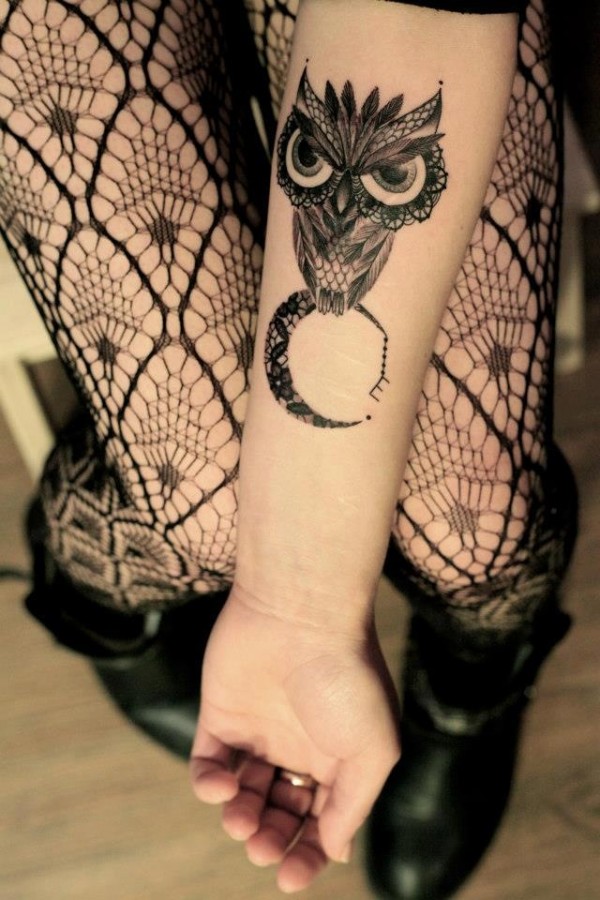 Angry owl and moon tattoo