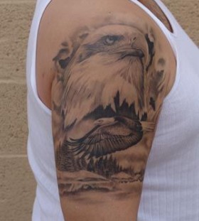 Awesome eagle shoulder football tattoo
