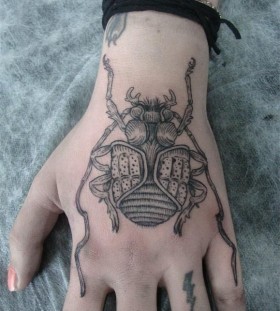 Awesome hand insect tattoo