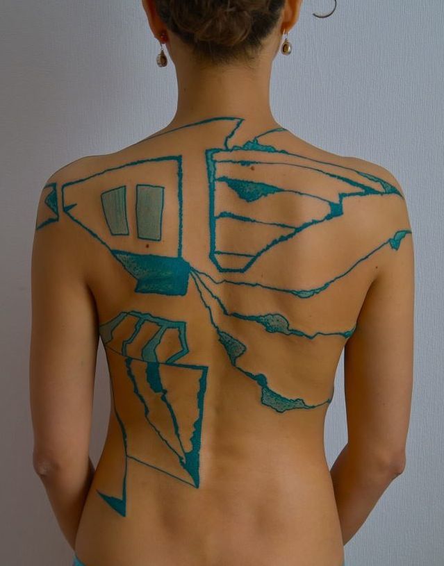 Back tattoo by Grisha Maslov
