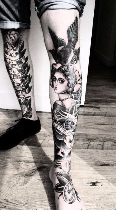 Bird and woman legs tattoo