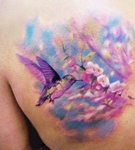 Birds and flowers tattoo by Adam Kremer