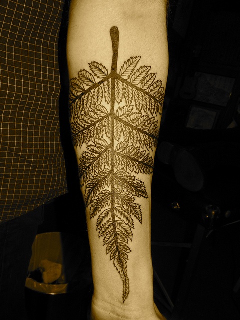 Black amazing leaf tattoo