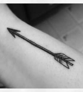 Black arrow tattoo