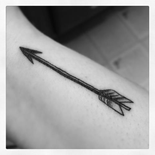 Black arrow tattoo