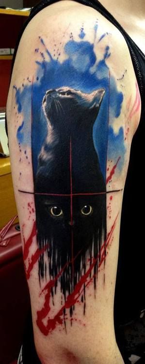 Black cat tattoo by Adam Kremer