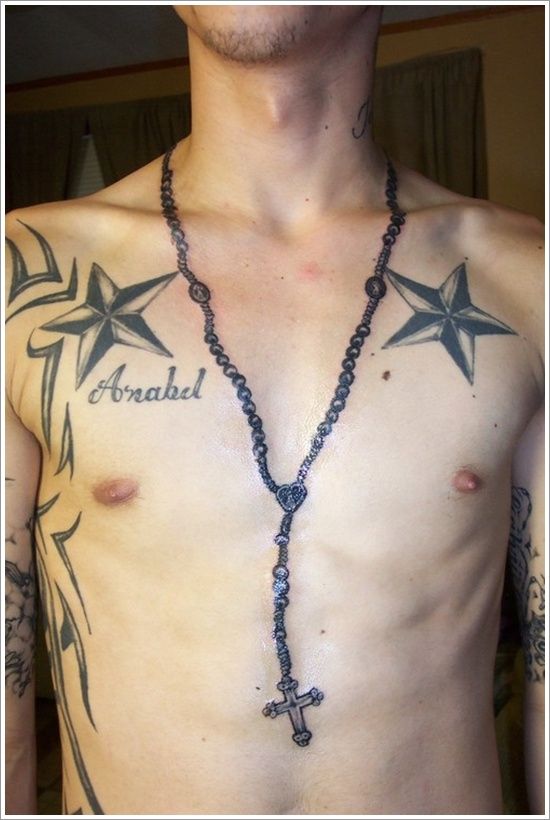Black chest star tattoo
