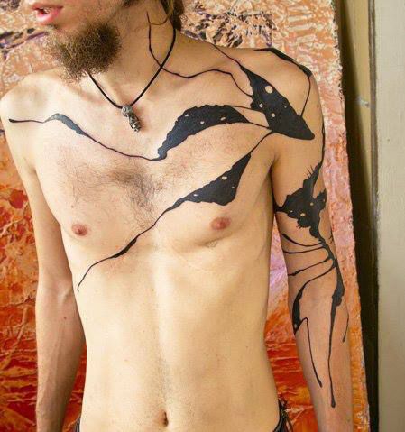 Black men’s tattoo by Grisha Maslov