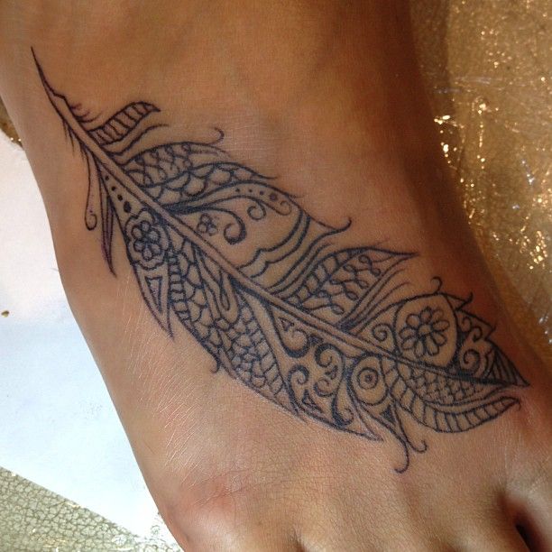 Black nice foot tattoo