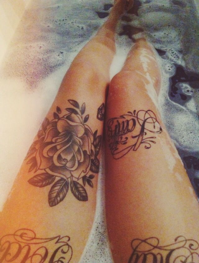 Black rose and words legs tattoo