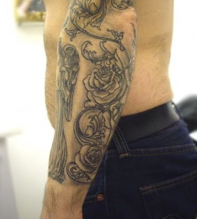 Black roses wings tattoo