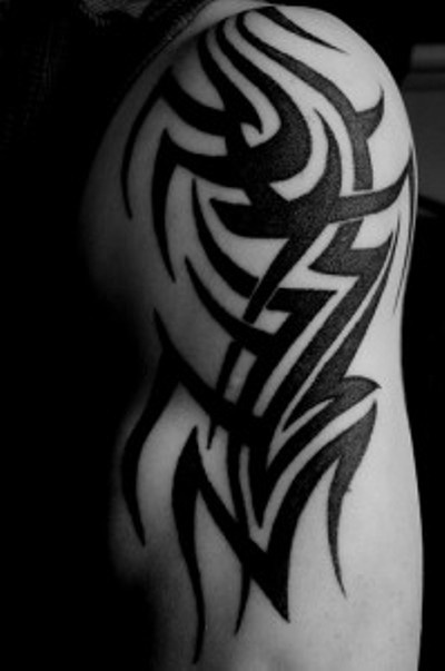 Black shoulder  tribal tattoo