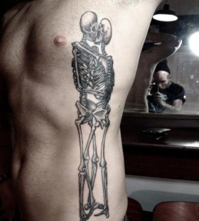 Black skull tattoo made by Berlin artist