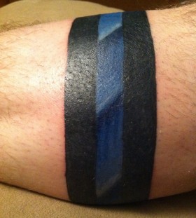 Blue and black lines tattoo