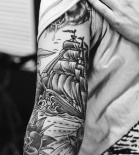 Boy's hand ship tattoo