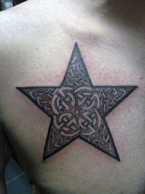 Brown star tattoo