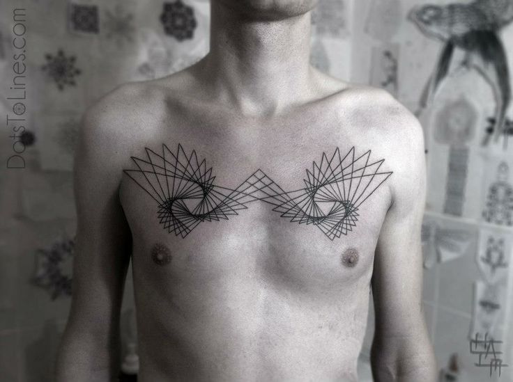 Chest lines tattoo by Chaim Machlev