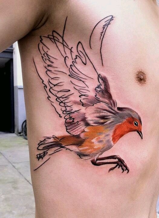 Colorful bird tattoo made by Berlin artist