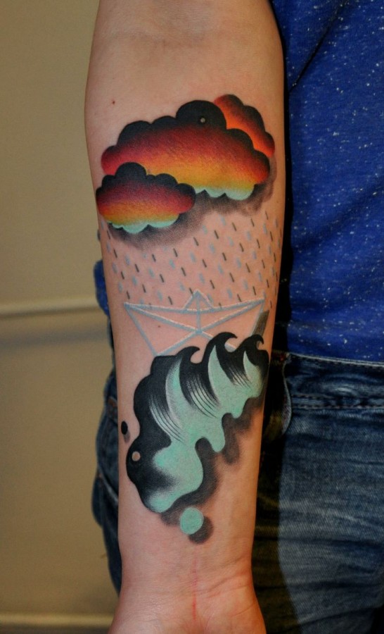 Colorful clouds cool tattoo