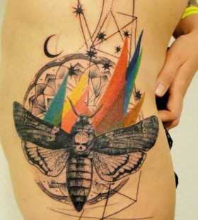 Colorful skull and insect tattoo