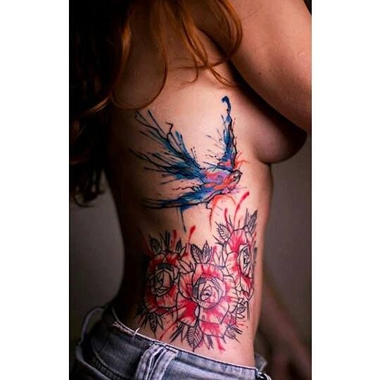 Colorful woman tattoo by Tyago Compiani