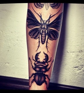 Cool insects tattoo made by Berlin artist