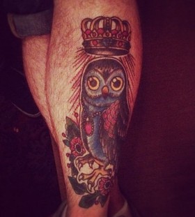 Crown and blue owl tattoo